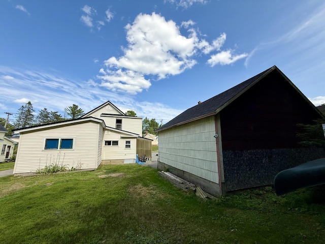322 Katahdin Ave, Millinocket, ME 04462 - rear view of property featuring a lawn