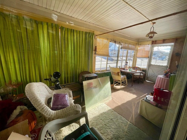 322 Katahdin Ave, Millinocket, ME 04462 - sunroom with carpet and plenty of natural light