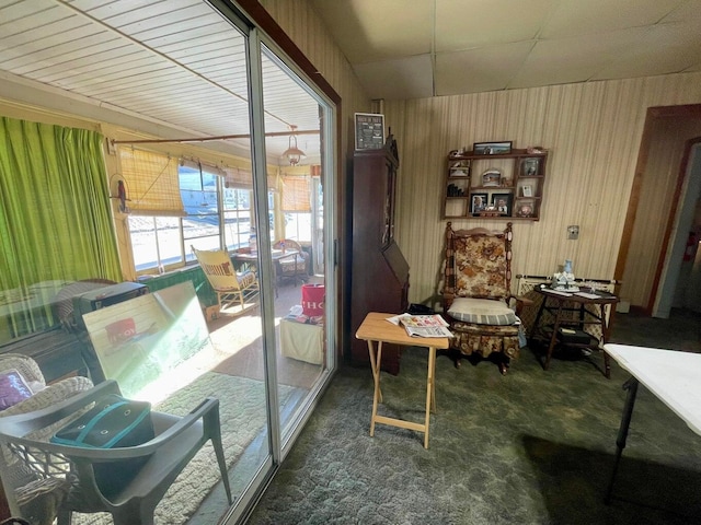 322 Katahdin Ave, Millinocket, ME 04462 - sitting room featuring carpet and wooden walls