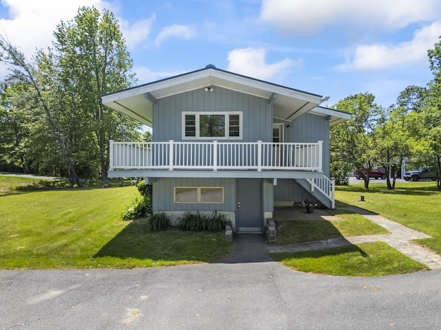 232 Augusta Rd, Topsham, ME 04086 - view of front of house featuring a front lawn, driveway, and stairway