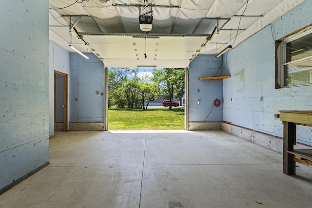 232 Augusta Rd, Topsham, ME 04086 - garage featuring a garage door opener