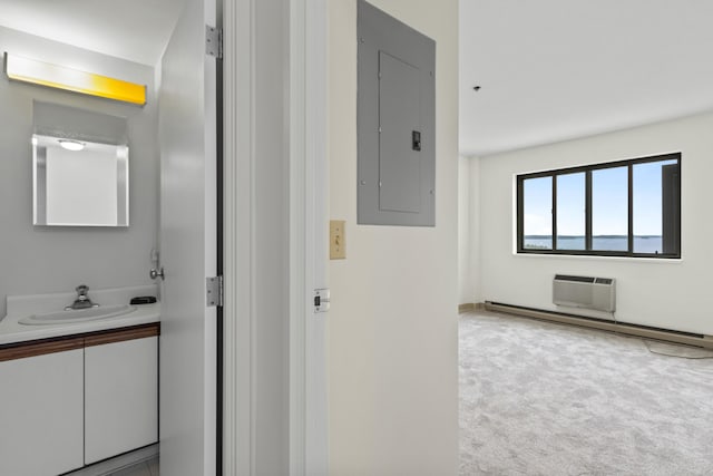 148 Breakwater Dr Unit 808, South Portland, ME 04106 - hallway featuring electric panel, a wall unit AC, and carpet flooring