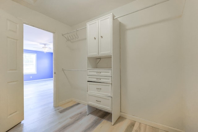 18 Wilson Dr, Westbrook, ME 04092 - walk in closet featuring light wood finished floors and ceiling fan