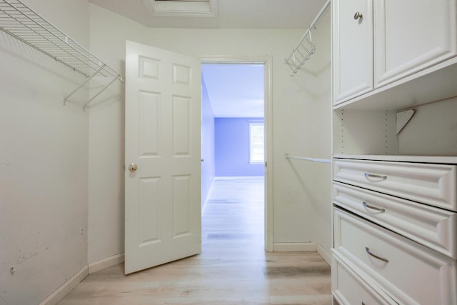 18 Wilson Dr, Westbrook, ME 04092 - spacious closet with light wood finished floors