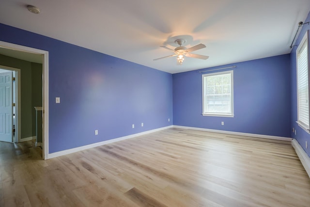 18 Wilson Dr, Westbrook, ME 04092 - spare room with light wood-style flooring, ceiling fan, and a smoke detector