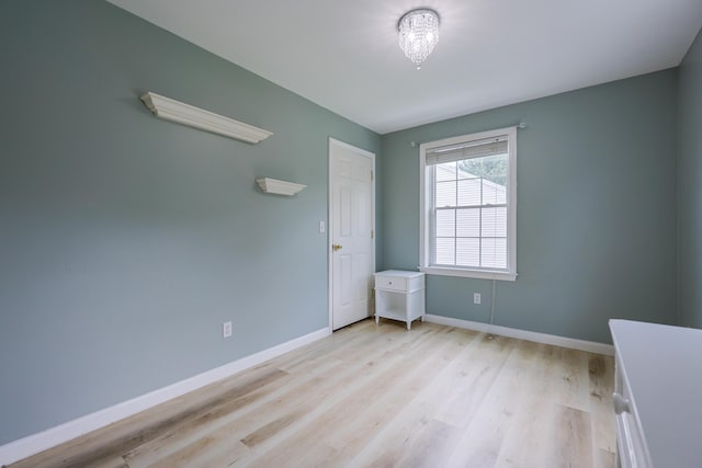 18 Wilson Dr, Westbrook, ME 04092 - spare room with light wood-type flooring and baseboards