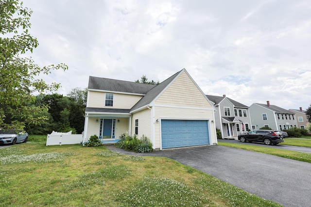 18 Wilson Dr, Westbrook, ME 04092 - traditional-style home featuring an attached garage, driveway, and a porch