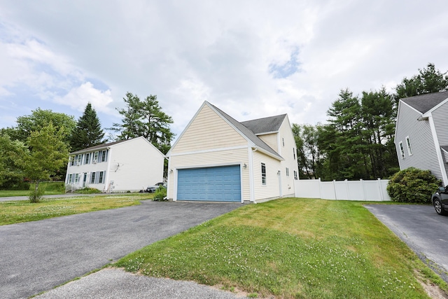 18 Wilson Dr, Westbrook, ME 04092 - view of property exterior with driveway and an attached garage