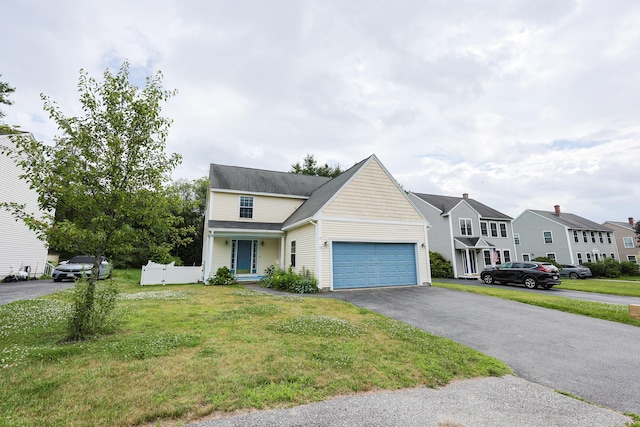 18 Wilson Dr, Westbrook, ME 04092 - traditional home featuring a garage and driveway
