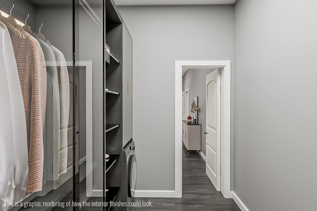 219 Outlook Rd, Woodstock, ME 04219 - spacious closet featuring stacked washer and clothes dryer and dark wood-type flooring