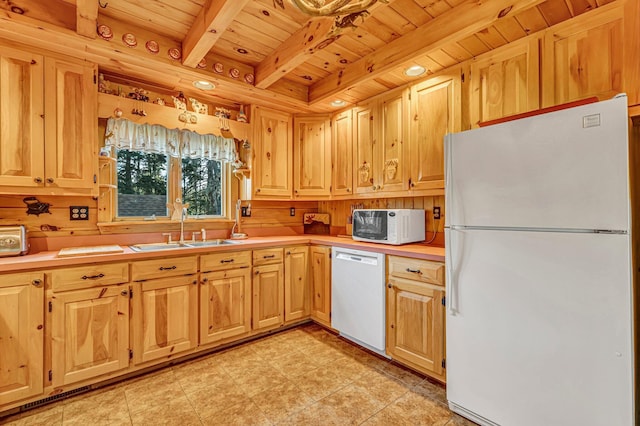 642 Mingo Loop Rd, Rangeley, ME 04970 - kitchen with white appliances, a wooden ceiling with exposed beams, light countertops, and light brown cabinets