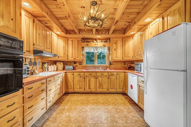 642 Mingo Loop Rd, Rangeley, ME 04970 - kitchen featuring white appliances, wooden ceiling, light countertops, a chandelier, and under cabinet range hood
