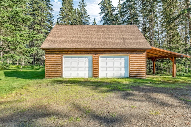 642 Mingo Loop Rd, Rangeley, ME 04970 - garage featuring a garage