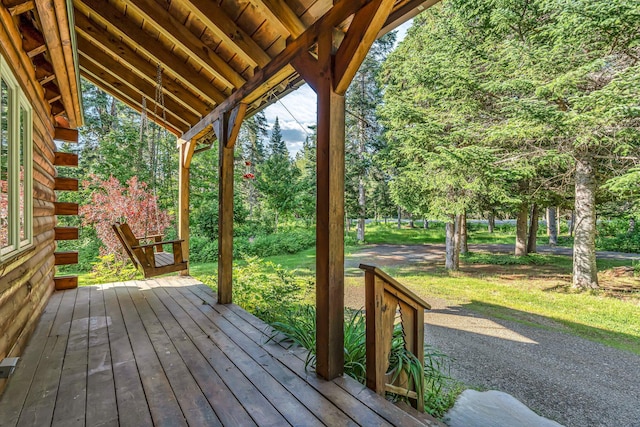 642 Mingo Loop Rd, Rangeley, ME 04970 - deck featuring a lawn