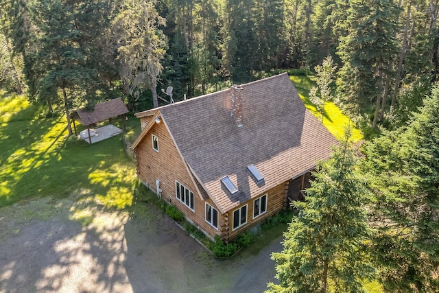 642 Mingo Loop Rd, Rangeley, ME 04970 - view from above of property featuring a heavily wooded area