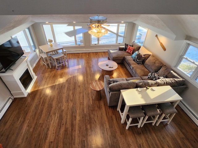 69 Scott Dr, Monmouth, ME 04259 - living area featuring baseboard heating, wood finished floors, and a ceiling fan