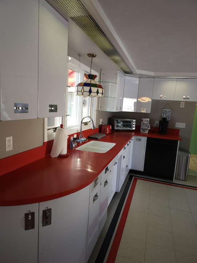 69 Scott Dr, Monmouth, ME 04259 - kitchen with white cabinets and decorative light fixtures