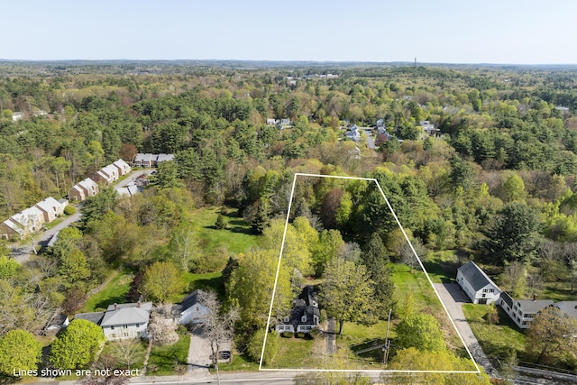 15 Winter St, Topsham, ME 04086 - aerial view of property's location with a heavily wooded area and property boundaries highlighted
