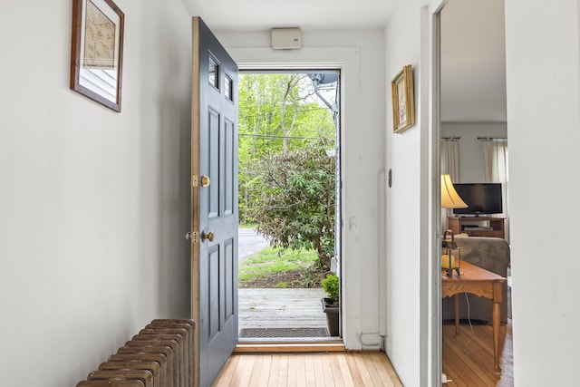 15 Winter St, Topsham, ME 04086 - entryway with light wood-style floors and radiator