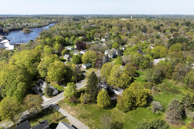 15 Winter St, Topsham, ME 04086 - view of property location featuring a nearby body of water and a heavily wooded area