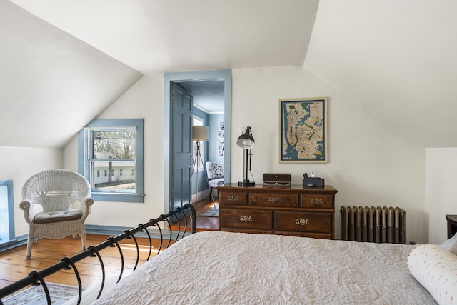 15 Winter St, Topsham, ME 04086 - bedroom featuring radiator, wood-type flooring, and lofted ceiling