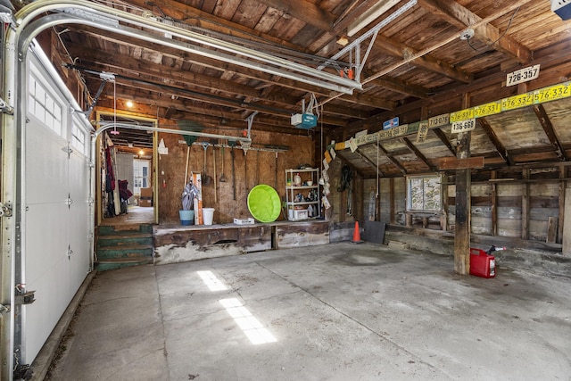 15 Winter St, Topsham, ME 04086 - garage featuring a garage door opener