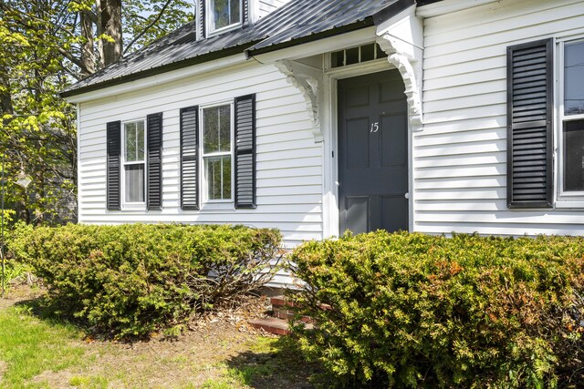 15 Winter St, Topsham, ME 04086 - property entrance with a metal roof