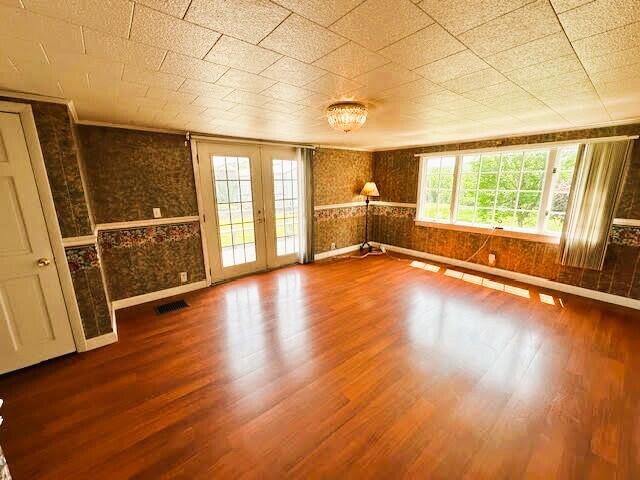 1039 Belfast Rd, Knox, ME 04986 - unfurnished room with wood finished floors and french doors