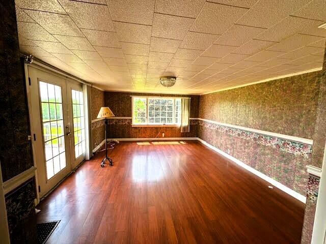 1039 Belfast Rd, Knox, ME 04986 - unfurnished room featuring wood finished floors and french doors
