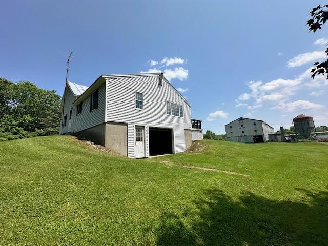 1039 Belfast Rd, Knox, ME 04986 - back of house with a yard