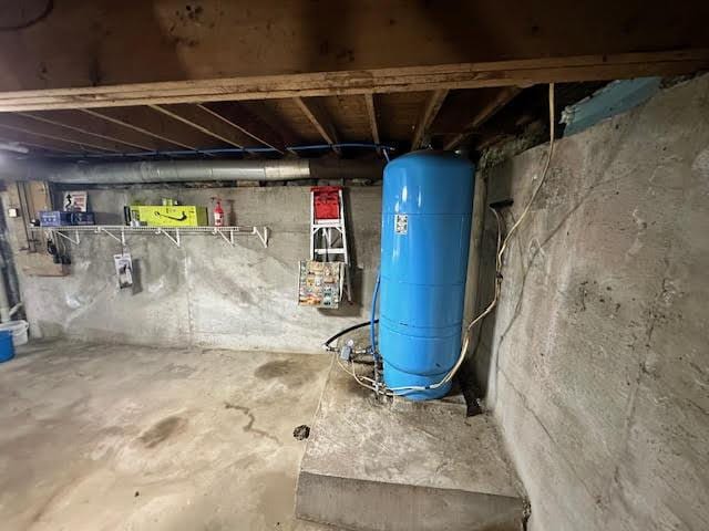 1039 Belfast Rd, Knox, ME 04986 - unfinished below grade area featuring a water pressure tank