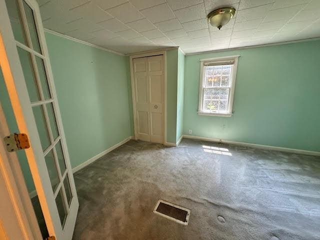 1039 Belfast Rd, Knox, ME 04986 - carpeted spare room with ornamental molding