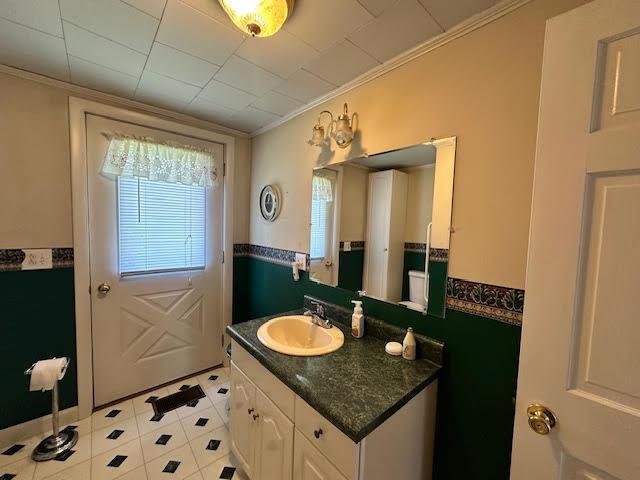 1039 Belfast Rd, Knox, ME 04986 - bathroom with vanity and crown molding