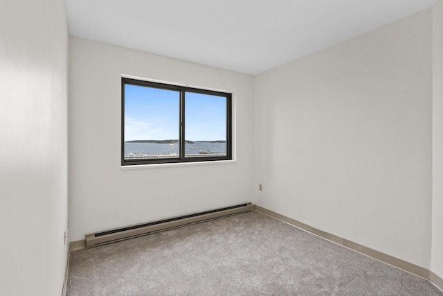 148 Breakwater Dr Unit 809, South Portland, ME 04106 - unfurnished room with baseboard heating and carpet