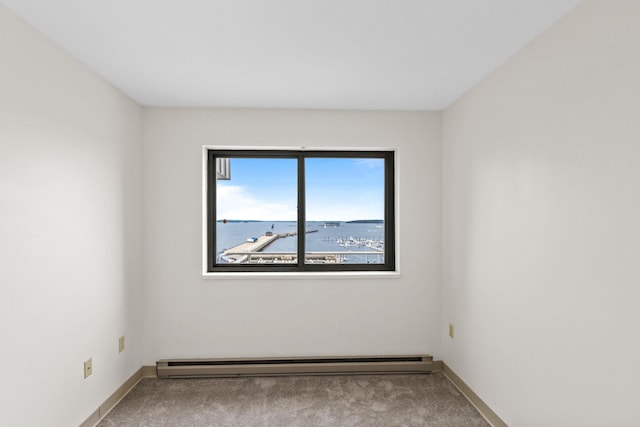 148 Breakwater Dr Unit 809, South Portland, ME 04106 - empty room with a baseboard heating unit and carpet