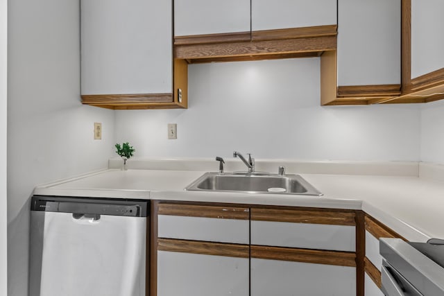 148 Breakwater Dr Unit 809, South Portland, ME 04106 - kitchen featuring stainless steel dishwasher, light countertops, and white cabinetry