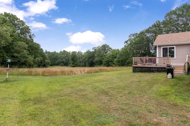 29 Folly Farm Rd, Lebanon, ME 04027 - view of green lawn featuring a wooden deck and a view of trees