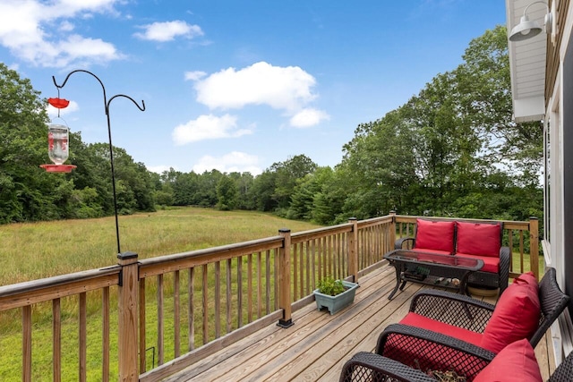 29 Folly Farm Rd, Lebanon, ME 04027 - wooden terrace with an outdoor hangout area and a lawn