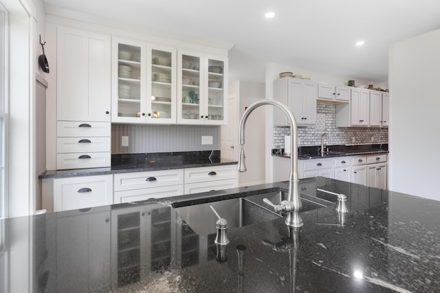 29 Folly Farm Rd, Lebanon, ME 04027 - kitchen with glass insert cabinets, white cabinetry, decorative backsplash, and recessed lighting