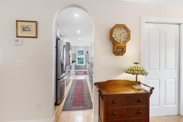 29 Folly Farm Rd, Lebanon, ME 04027 - corridor with light wood finished floors, arched walkways, and recessed lighting