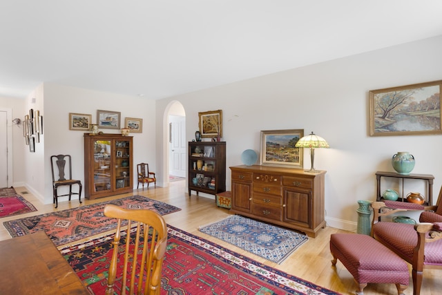 29 Folly Farm Rd, Lebanon, ME 04027 - living room with arched walkways and wood finished floors