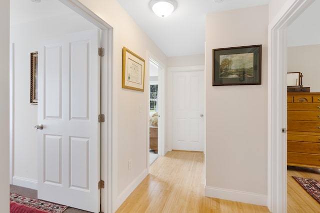 29 Folly Farm Rd, Lebanon, ME 04027 - corridor featuring light wood-style floors and baseboards