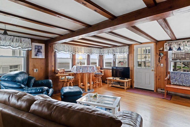 428 Eldridge Rd, Wells, ME 04090 - living room with beam ceiling, wood finished floors, and wooden walls