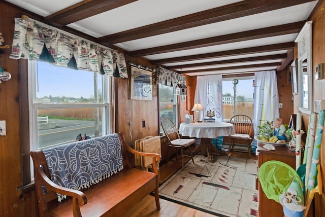 428 Eldridge Rd, Wells, ME 04090 - sunroom / solarium featuring beam ceiling, wooden walls, and wood finished floors