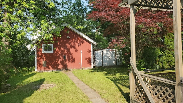 236 Birch St, Bangor, ME 04401 - view of green lawn with a storage shed