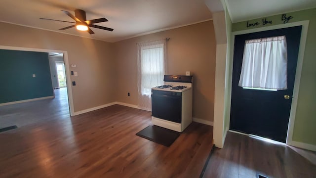 236 Birch St, Bangor, ME 04401 - kitchen featuring white gas range oven, dark wood finished floors, and ceiling fan