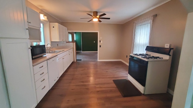 236 Birch St, Bangor, ME 04401 - kitchen featuring white appliances, white cabinets, a ceiling fan, and healthy amount of natural light