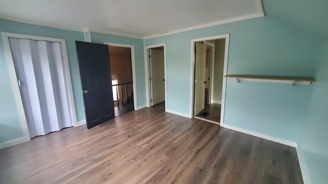 236 Birch St, Bangor, ME 04401 - unfurnished bedroom featuring wood finished floors and baseboards