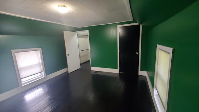 236 Birch St, Bangor, ME 04401 - bonus room featuring baseboards and dark wood-type flooring