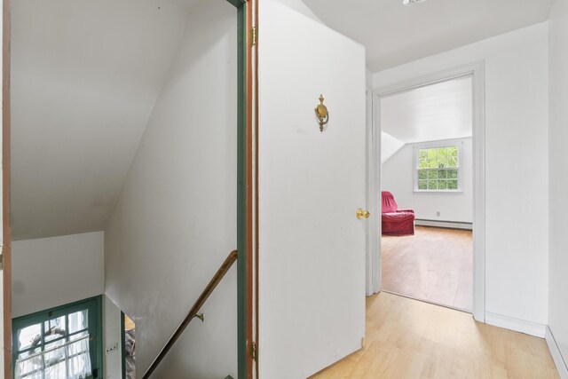 14 Lakeshore Dr, Belgrade, ME 04918 - corridor with an upstairs landing, a baseboard radiator, light wood-type flooring, and lofted ceiling